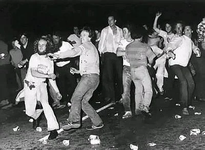 A crowd fills the street outside the Stonewall Inn during nights of protest