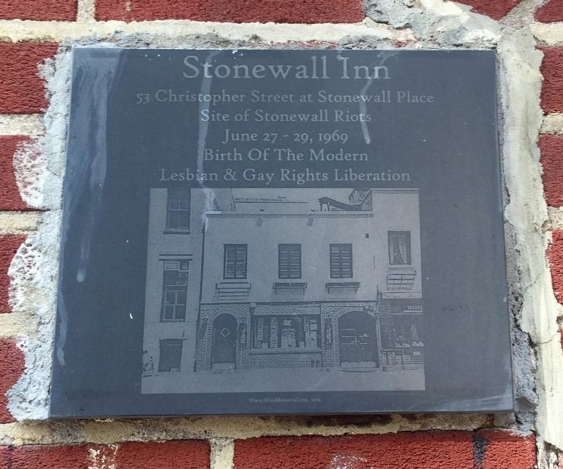 A commemorative plaque marking the Stonewall Inn as the site of the 1969 Stonewall Riots