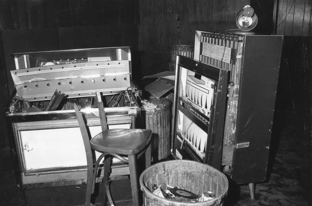 A destroyed jukebox and cigarette machine inside the Stonewall Inn after the 1969 raid
